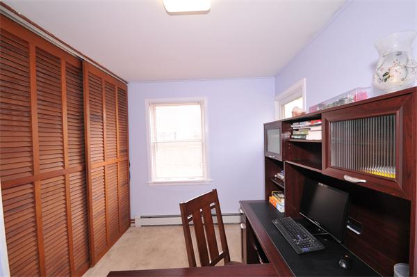 28 Hardwick Road Natick, MA 01760 - Photo 17 of 30 a view of an empty room with wooden floor