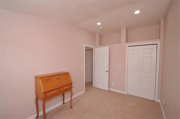 28 Hardwick Road Natick, MA 01760 - Photo 26 of 30 a view of an empty room with a kitchen