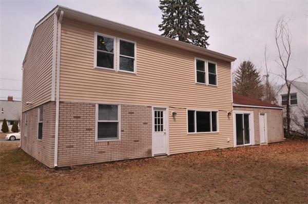 28 Hardwick Road Natick, MA 01760 - Photo 29 of 30 a view of a house with a yard