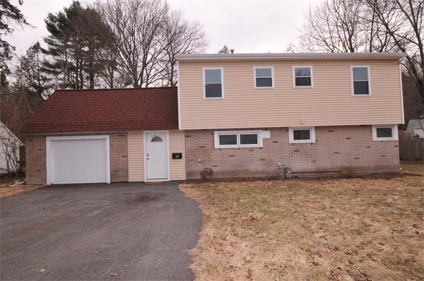 28 Hardwick Road Natick, MA 01760 - Photo 30 of 30 a view of a house with a yard