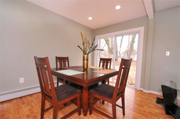 28 Hardwick Road Natick, MA 01760 - Photo 3 of 30 a view of a dining room with furniture window and wooden floor