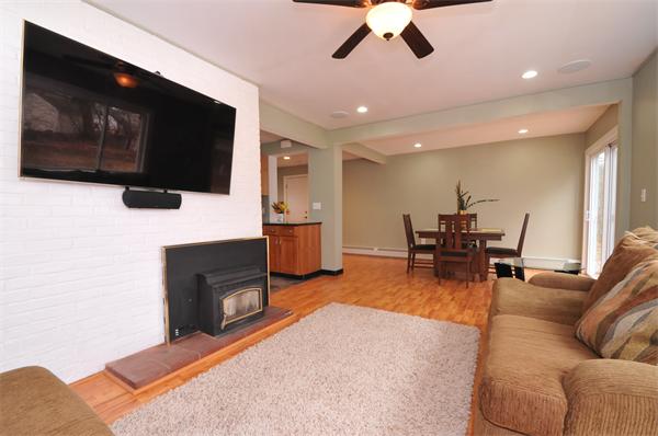 28 Hardwick Road Natick, MA 01760 - Photo 5 of 30 a living room with furniture and a flat screen tv