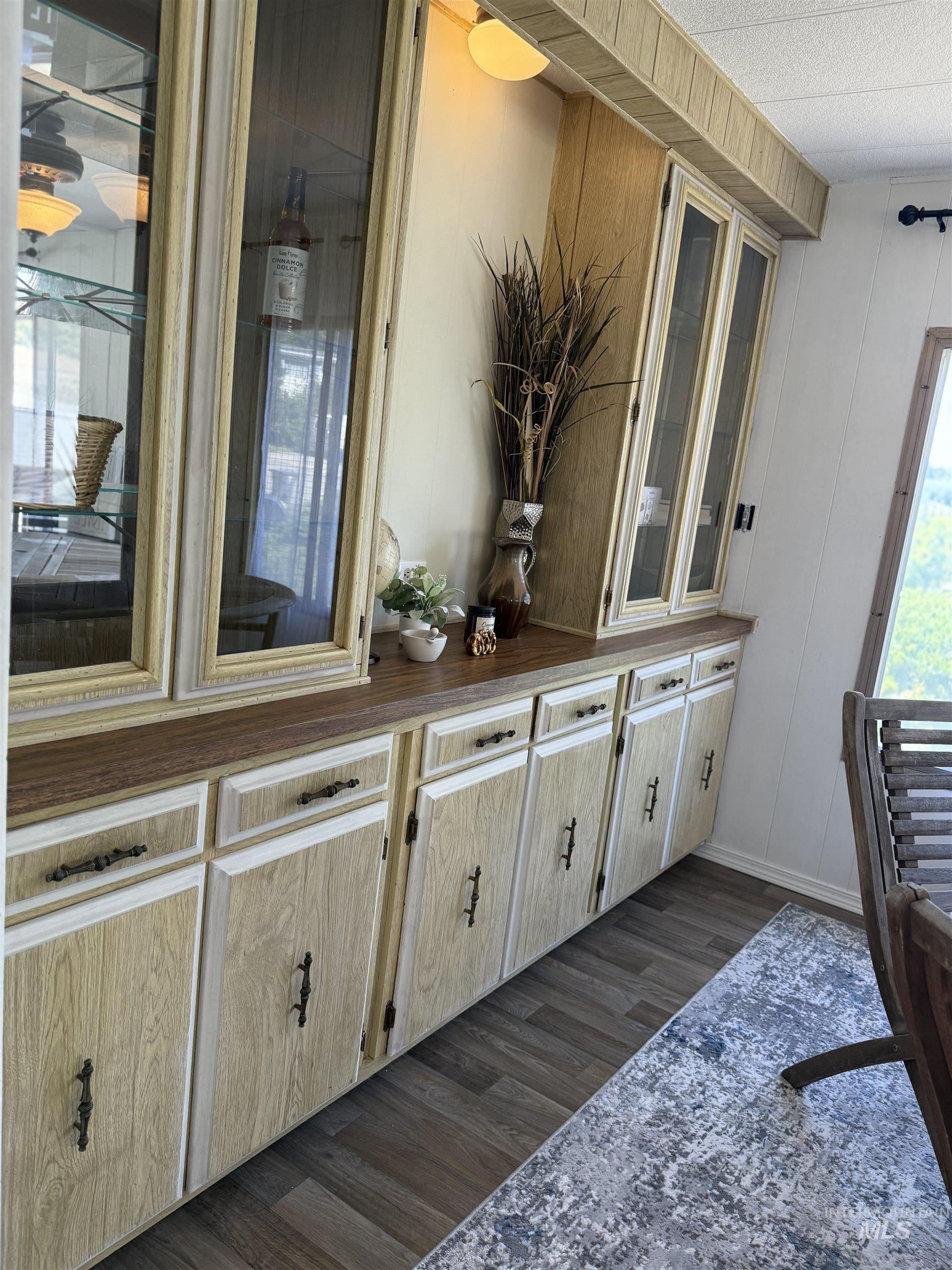 605 North Almon Street, Unit 44 Moscow, ID 83843 - Photo 4 of 34 Bar area featuring dark wood-type flooring