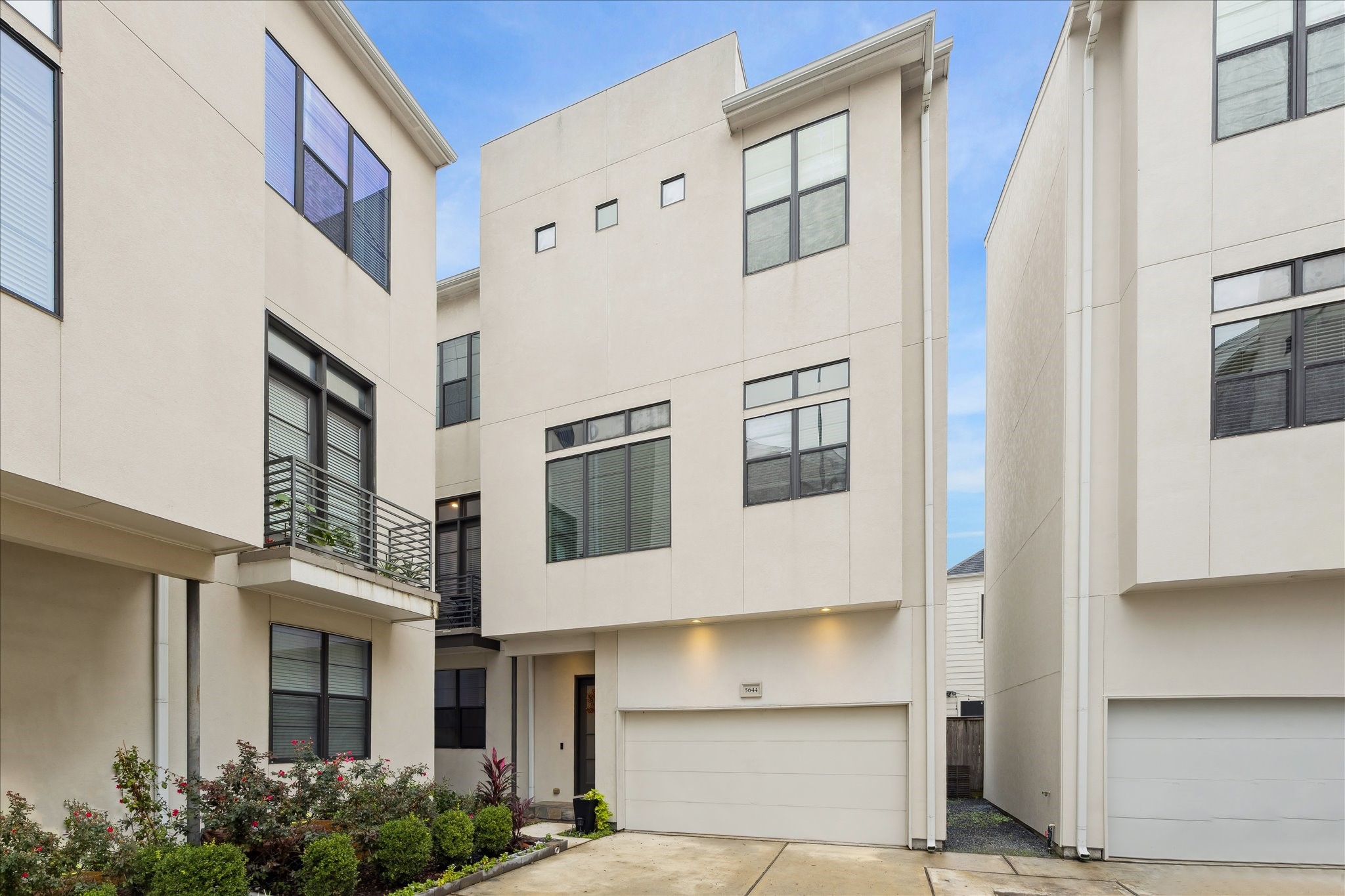 a view of building with glass windows
