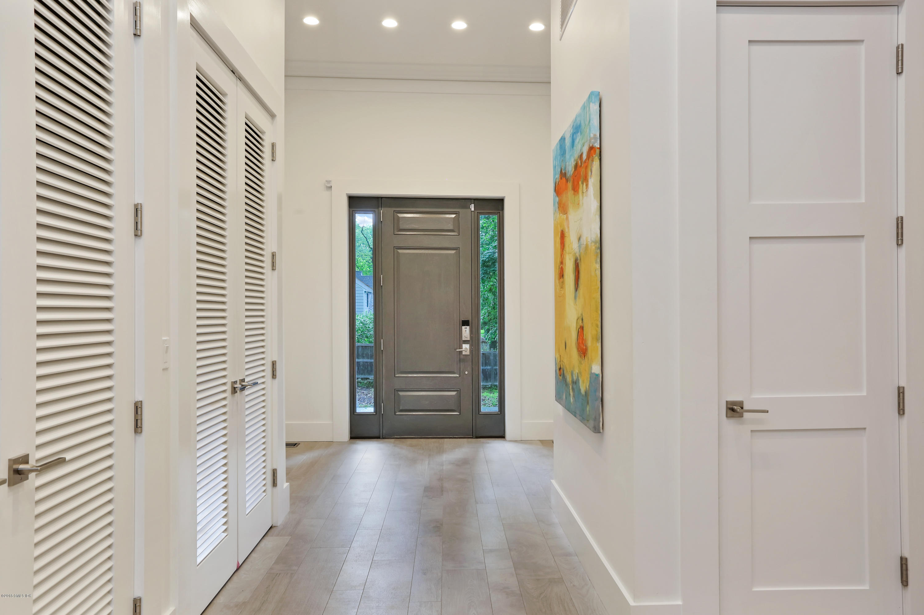 22 Oak Drive Riverside, CT 06878 - Photo 13 of 32 a view of hallway with wooden floor
