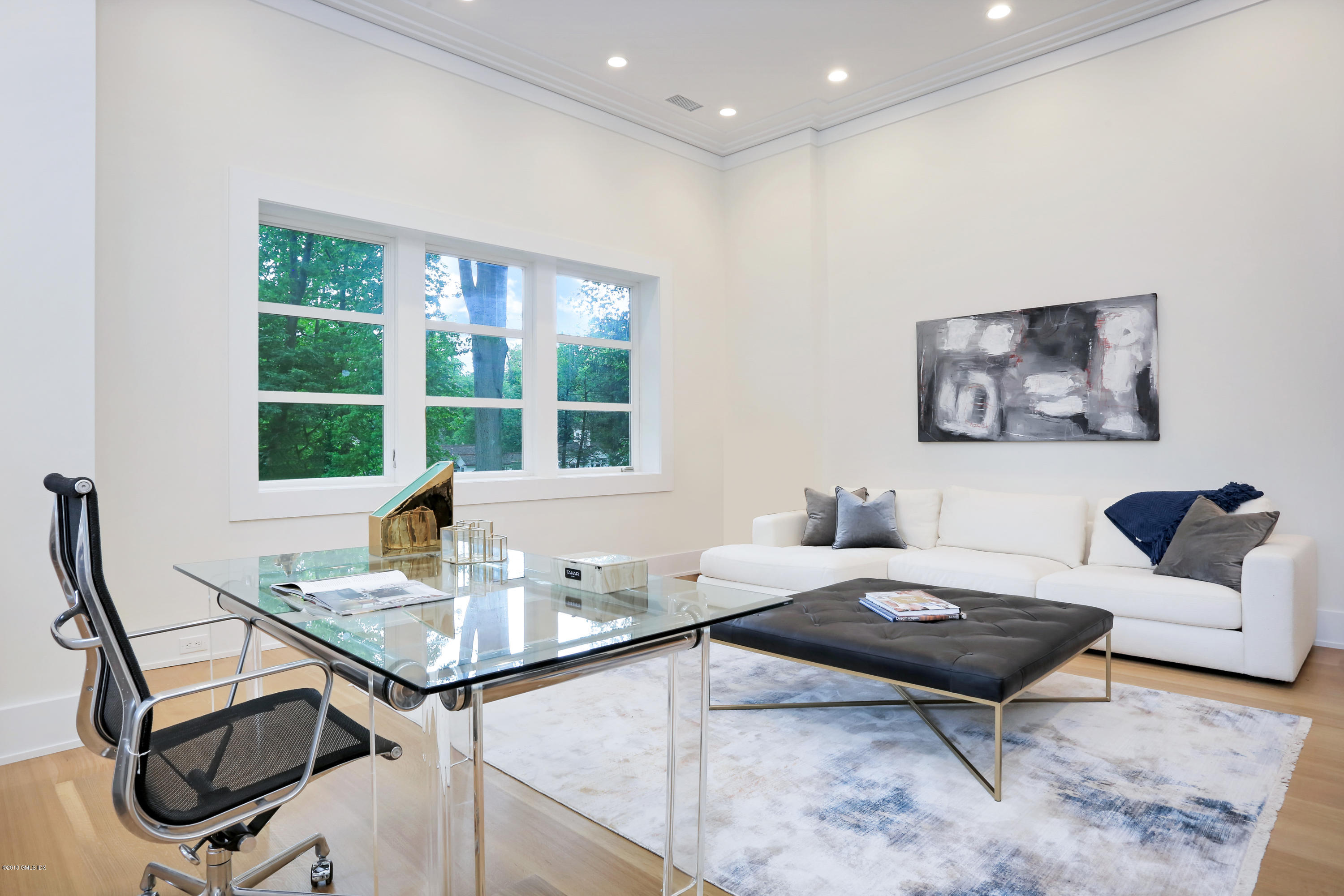 22 Oak Drive Riverside, CT 06878 - Photo 15 of 32 a living room with a couch and a window