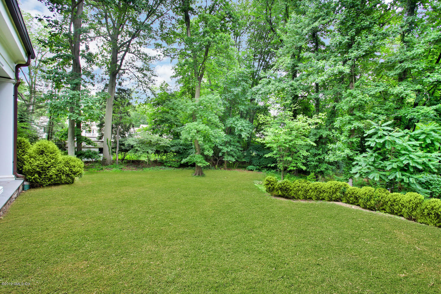 22 Oak Drive Riverside, CT 06878 - Photo 29 of 32 a view of a garden