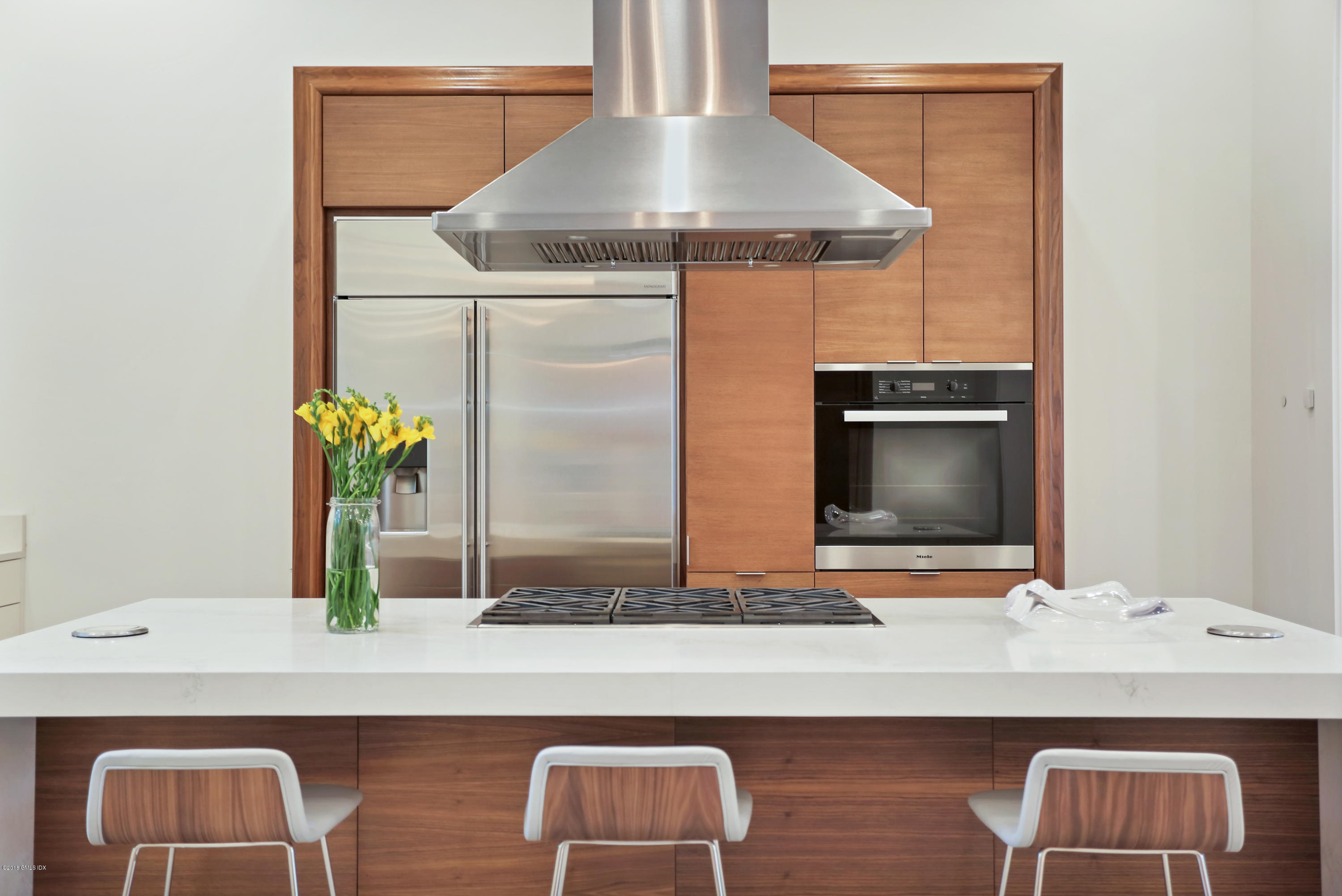 22 Oak Drive Riverside, CT 06878 - Photo 5 of 32 a bathroom with a sink and a mirror
