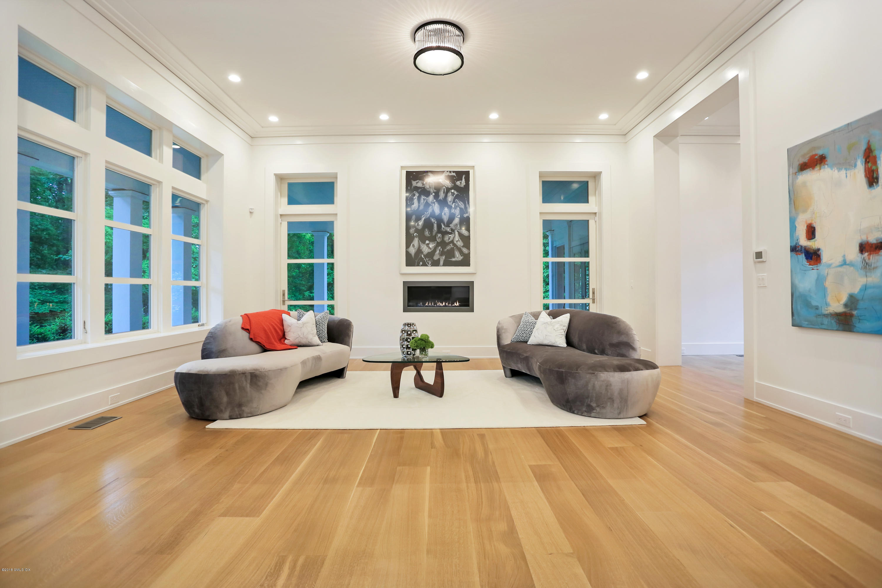 22 Oak Drive Riverside, CT 06878 - Photo 10 of 32 a living room with furniture and window