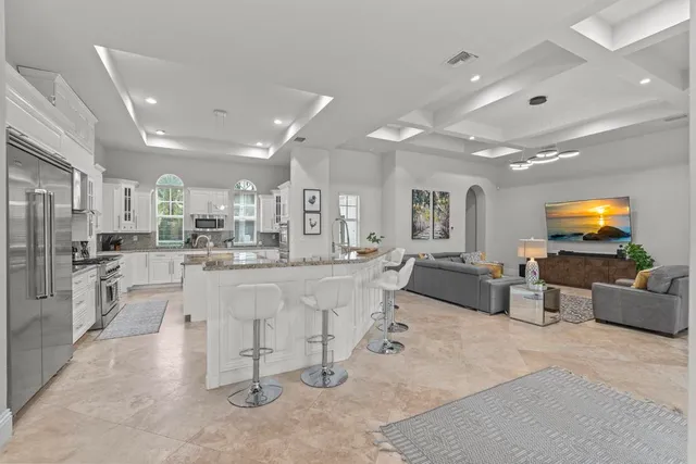 a bedroom with a bed and a couch