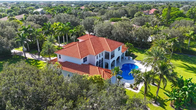a kitchen with granite countertop cabinets stainless steel appliances a sink and a counter top space