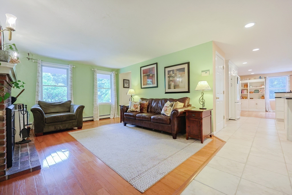 4 Rainbow Drive Medway, MA 02053 - Photo 12 of 42 a living room with furniture and a wooden floor