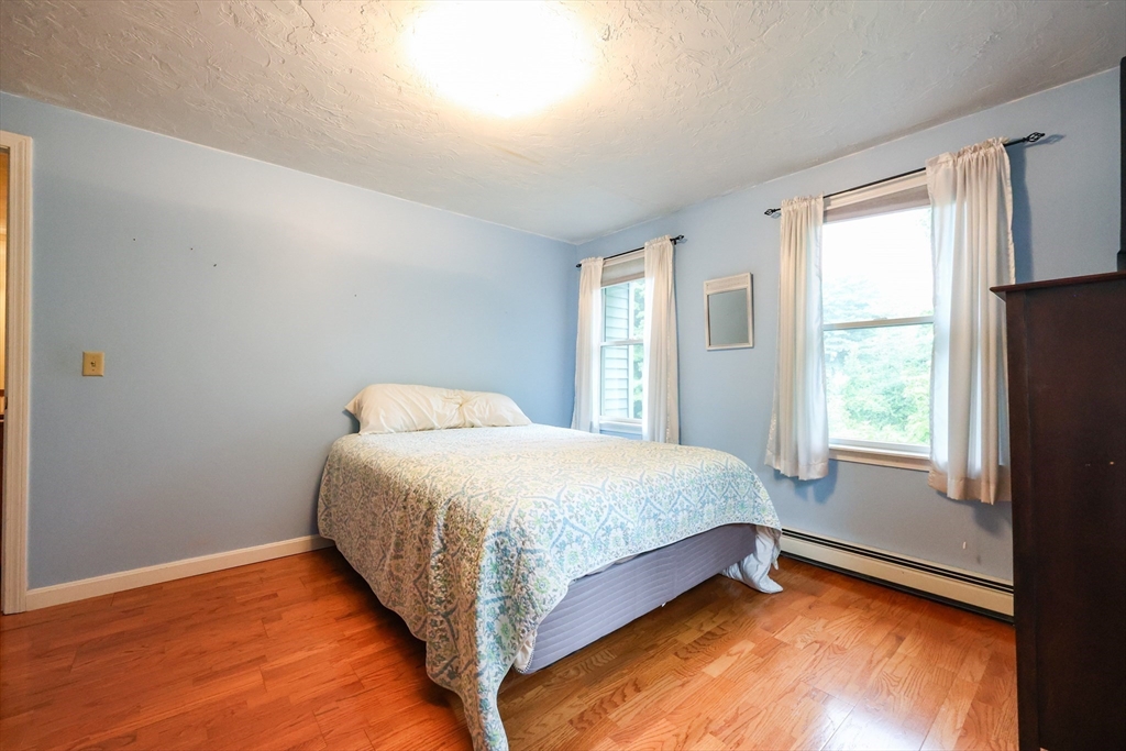 4 Rainbow Drive Medway, MA 02053 - Photo 27 of 42 a bedroom with a bed and window