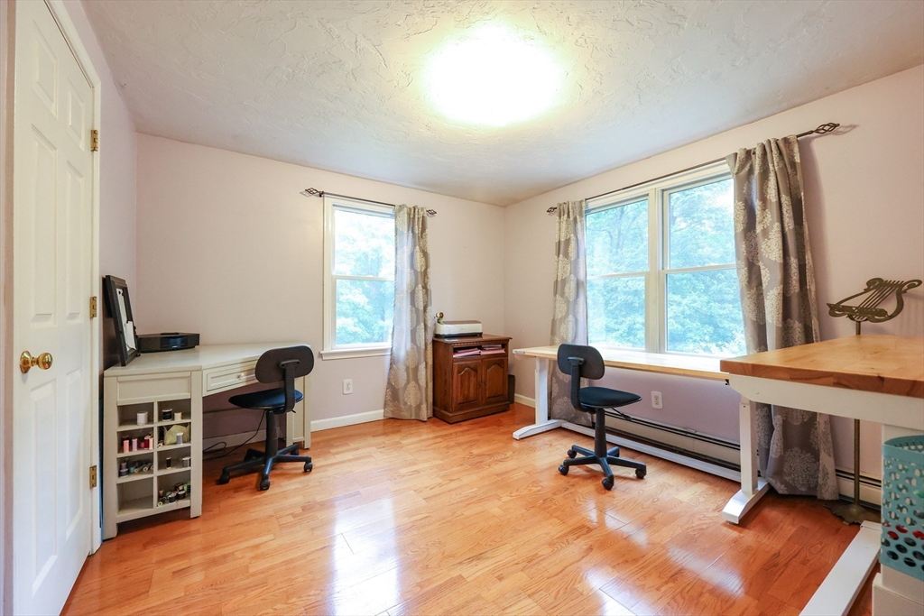 4 Rainbow Drive Medway, MA 02053 - Photo 29 of 42 a view of a workspace with furniture and a window