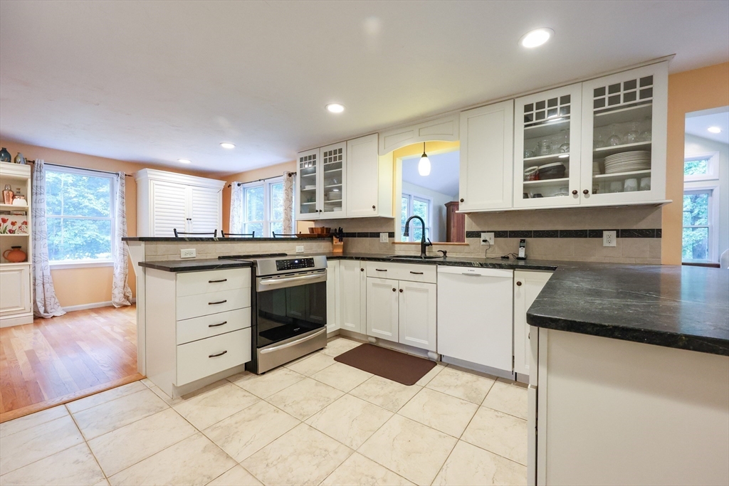4 Rainbow Drive Medway, MA 02053 - Photo 5 of 42 a kitchen with a stove a sink and a refrigerator
