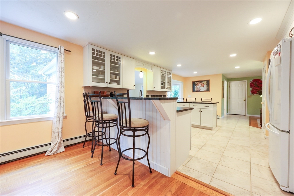 4 Rainbow Drive Medway, MA 02053 - Photo 6 of 42 a view of a dining room with furniture and wooden floor