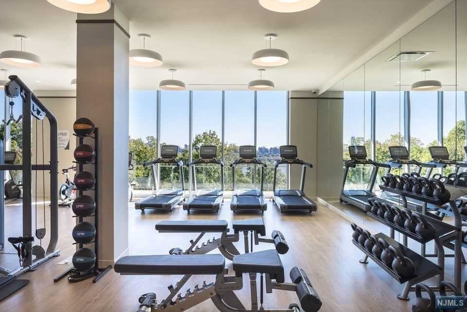 320 Adolphus Avenue, Unit 117 Cliffside Park, NJ 07010 - Photo 14 of 27 a living room filled with furniture