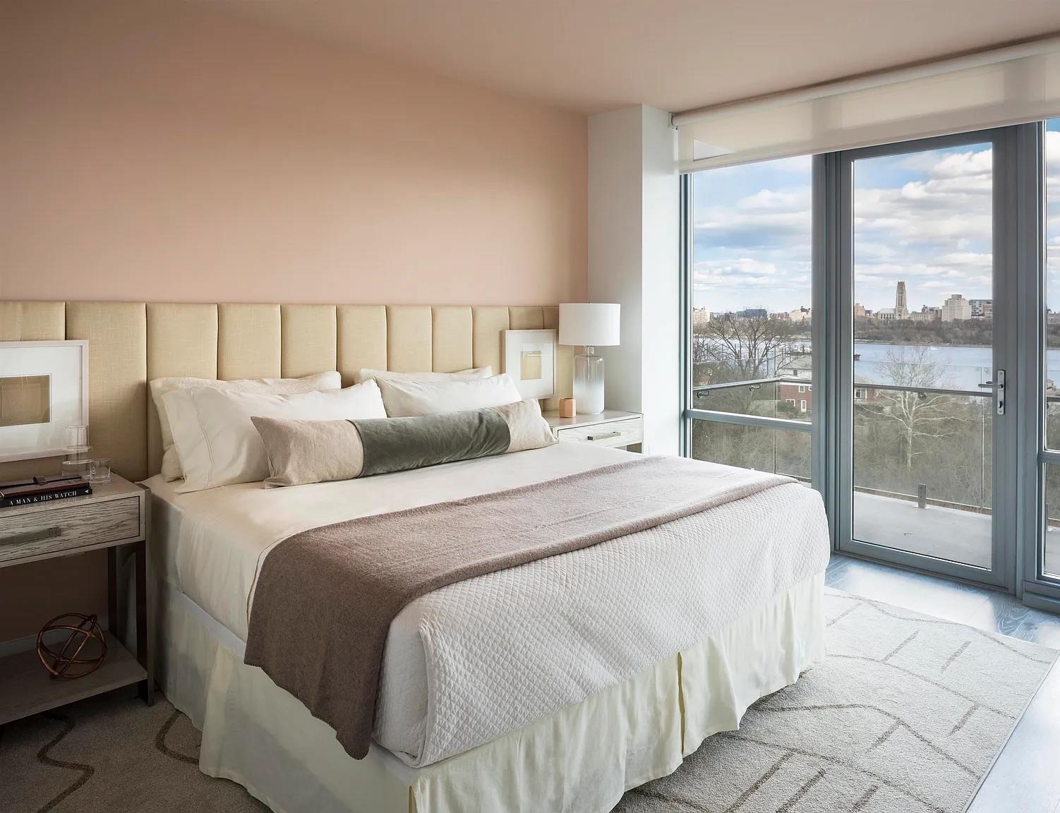 320 Adolphus Avenue, Unit 117 Cliffside Park, NJ 07010 - Photo 6 of 27 a large bed sitting in a bedroom next to a window