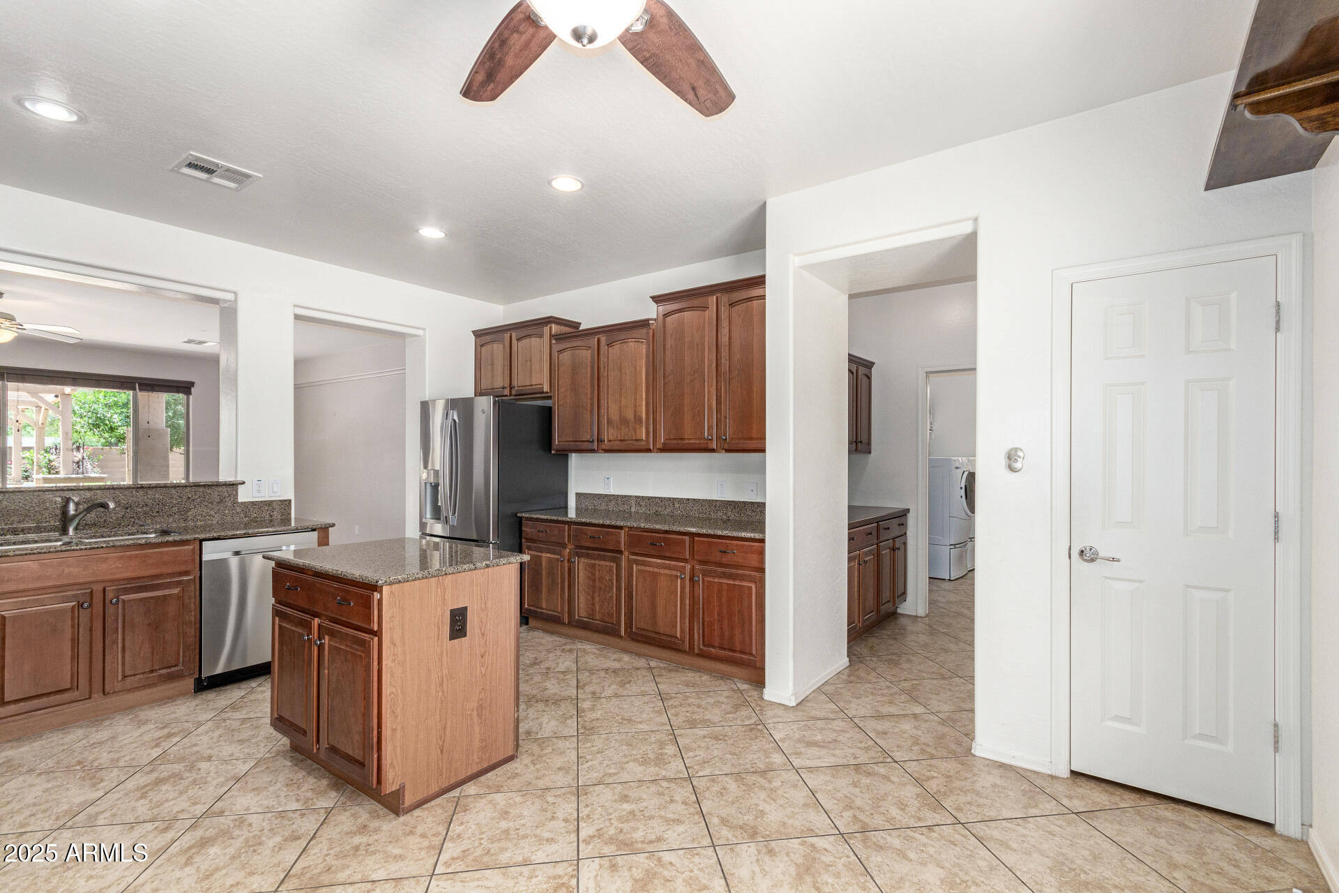 19319 East Thornton Road Queen Creek, AZ 85142 - Photo 5 of 17 Kitchen + Laundry Room