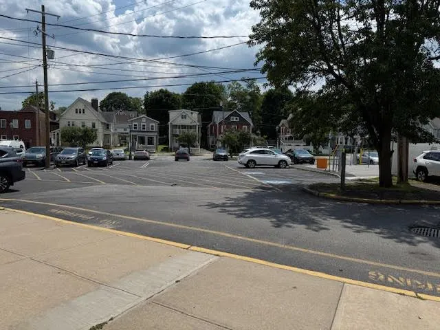 a view of a street with cars