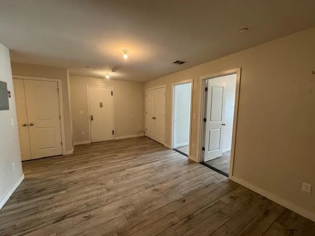 a view of a building with sitting area