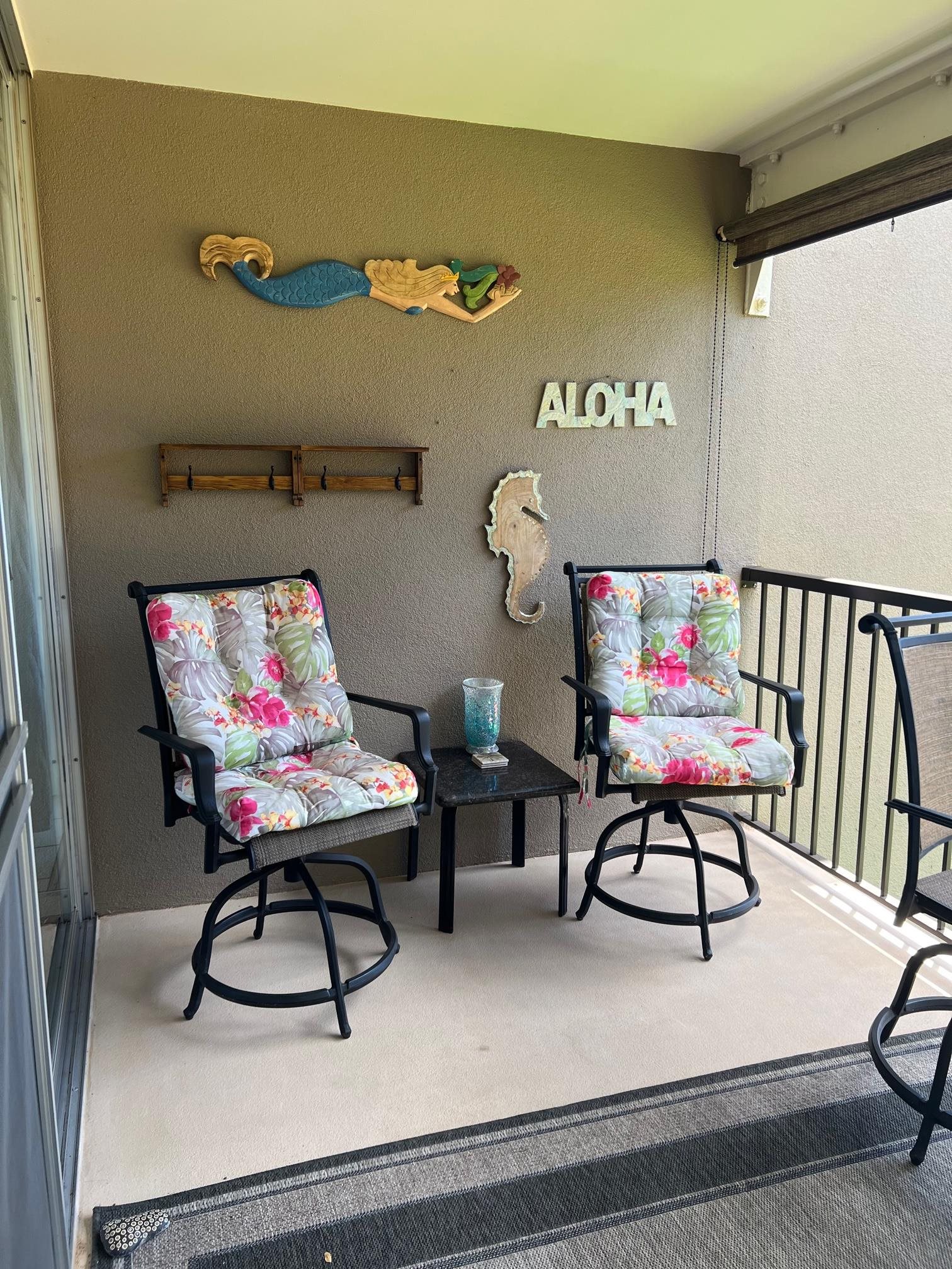 3823 Lower Honoapiilani Road, Unit 211 Lahaina, HI 96761 - Photo 17 of 34 a view of a chairs and table in a room