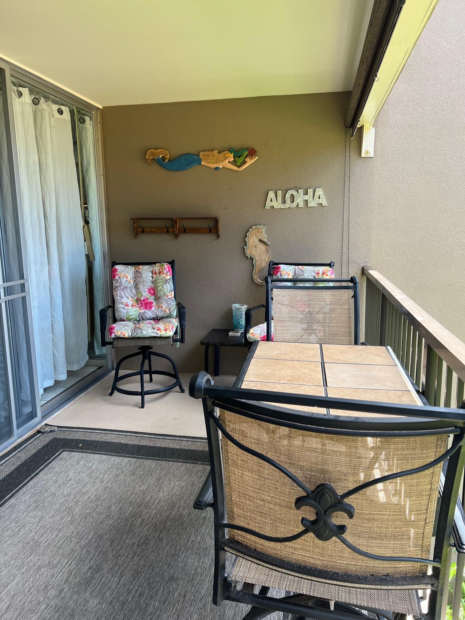3823 Lower Honoapiilani Road, Unit 211 Lahaina, HI 96761 - Photo 18 of 34 a bedroom with furniture and a window
