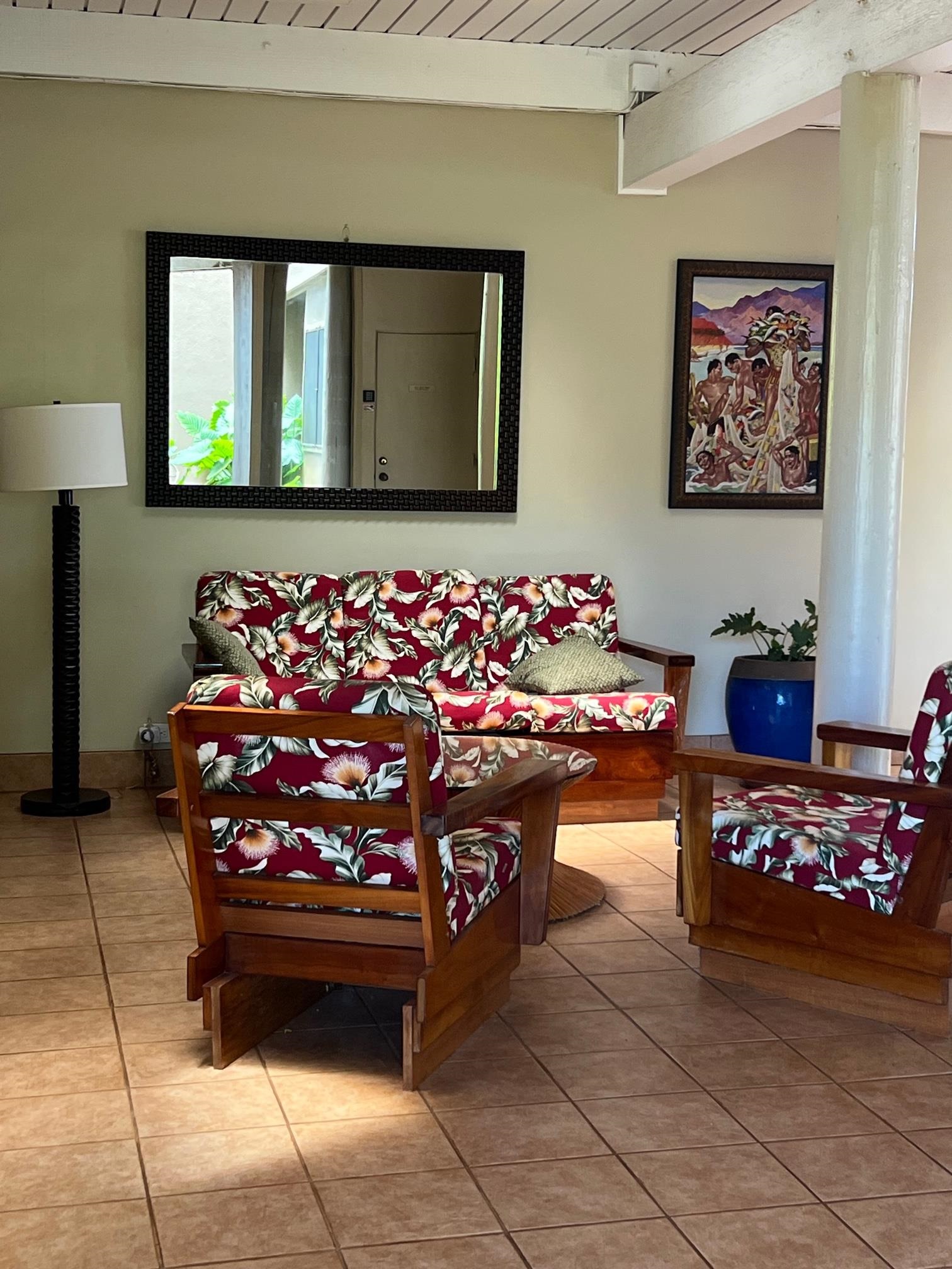 3823 Lower Honoapiilani Road, Unit 211 Lahaina, HI 96761 - Photo 22 of 34 a wooden bench sitting in a room next to a window