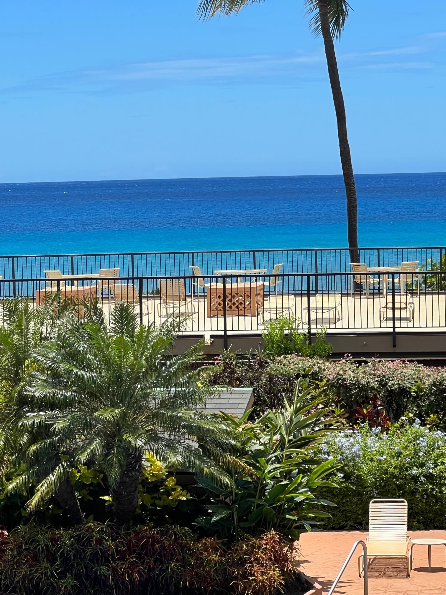 3823 Lower Honoapiilani Road, Unit 211 Lahaina, HI 96761 - Photo 24 of 34 a view of a lake with a building in the background