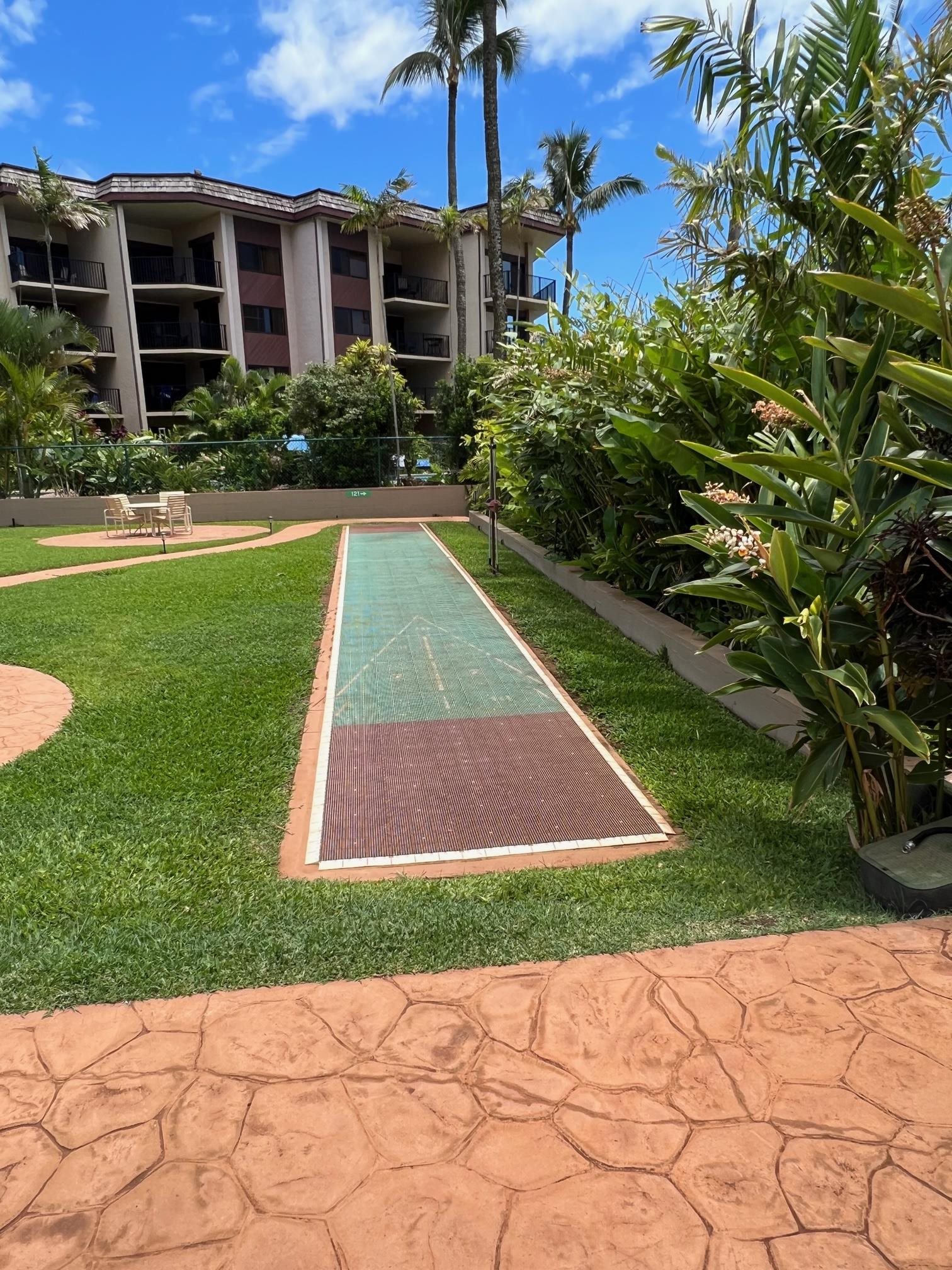 3823 Lower Honoapiilani Road, Unit 211 Lahaina, HI 96761 - Photo 26 of 34 a view of outdoor space yard and front view of a house