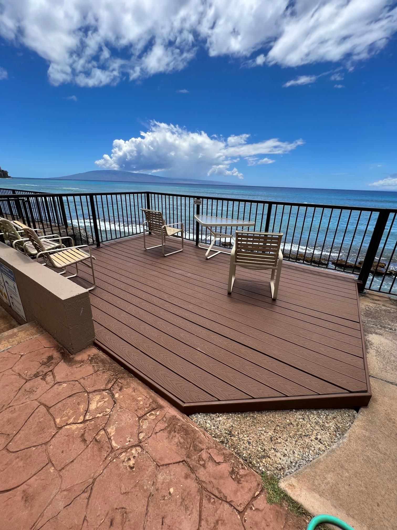 3823 Lower Honoapiilani Road, Unit 211 Lahaina, HI 96761 - Photo 34 of 34 a view of a terrace with furniture