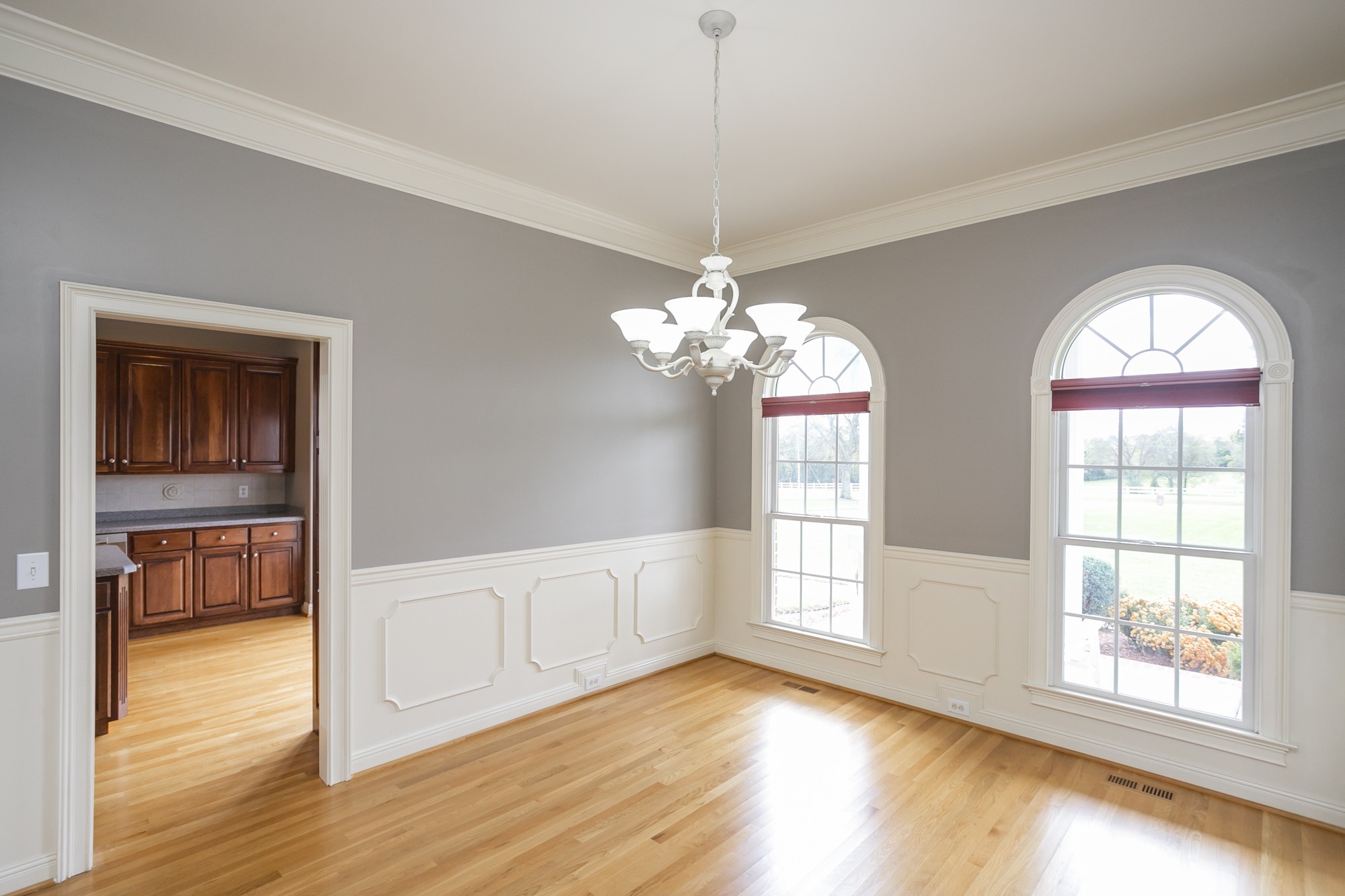 184 Rock Bridge Road Gallatin, TN 37066 - Photo 14 of 50 a view of empty room with wooden floor and fan