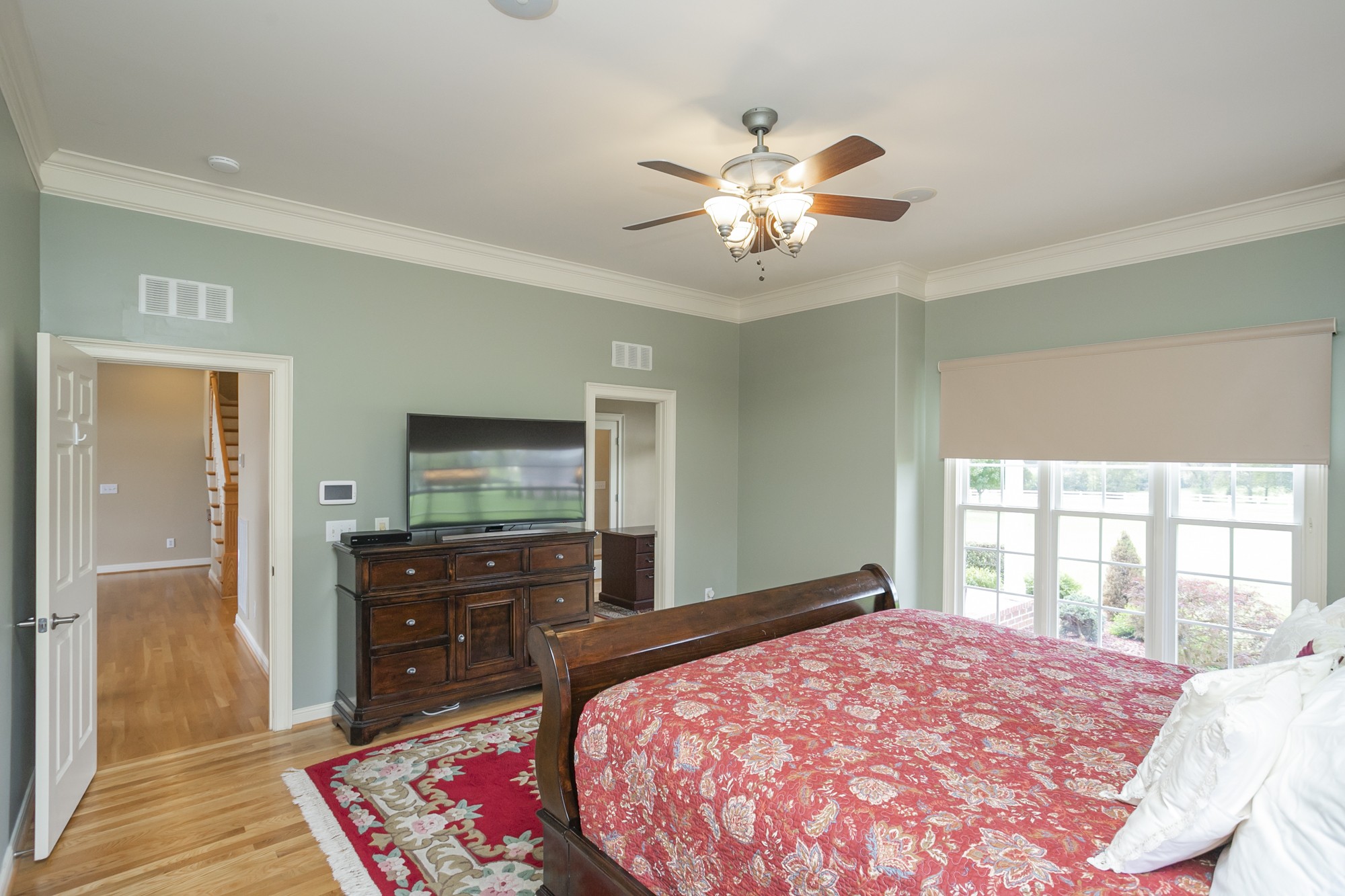 184 Rock Bridge Road Gallatin, TN 37066 - Photo 21 of 50 a bed room with a bed and a television