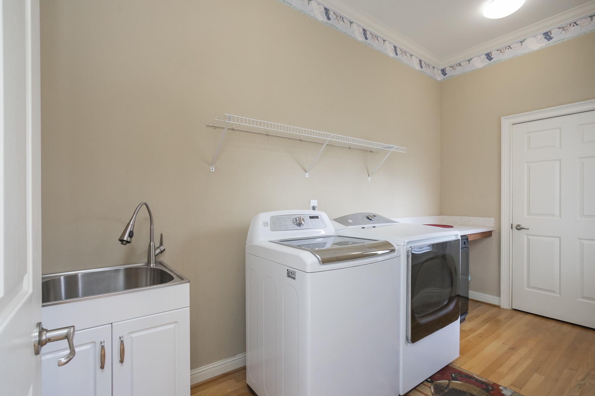 184 Rock Bridge Road Gallatin, TN 37066 - Photo 37 of 50 a utility room with sink dryer and washer