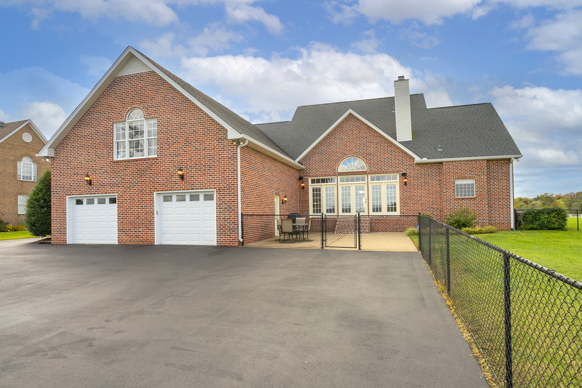 184 Rock Bridge Road Gallatin, TN 37066 - Photo 40 of 50 a front view of a house with a yard and garage