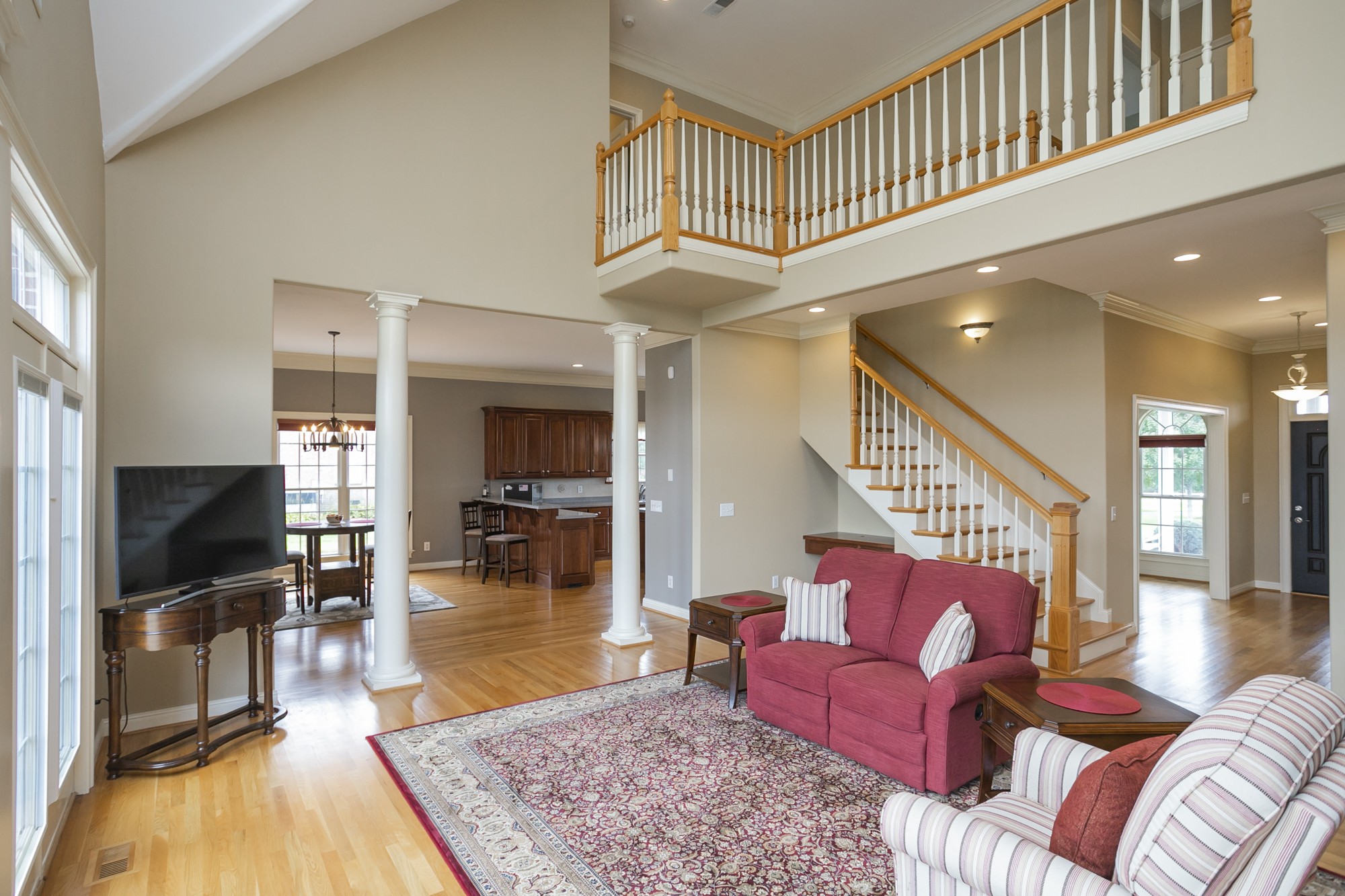 184 Rock Bridge Road Gallatin, TN 37066 - Photo 7 of 50 a living room with furniture a flat screen tv and a dining table