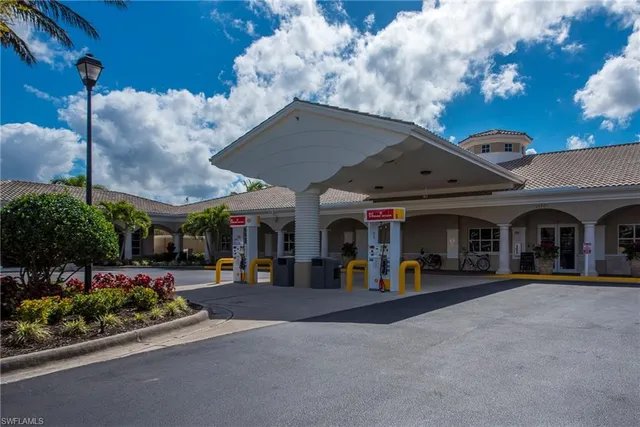 a view of a building with sitting area