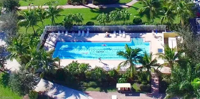 a view of yard with outdoor seating and trees