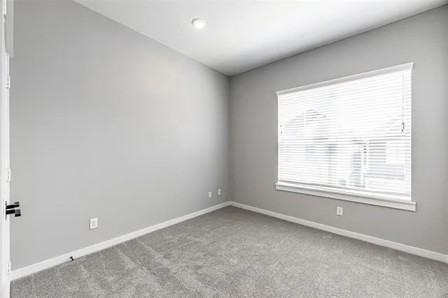 a bathroom with a sink vanity and a mirror