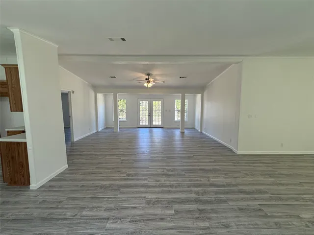 a view of livingroom and hardwood floor