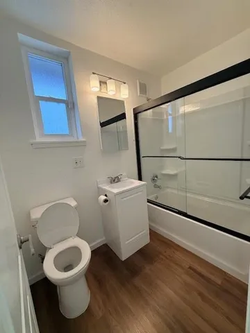 a kitchen with granite countertop white cabinets and a granite counter tops