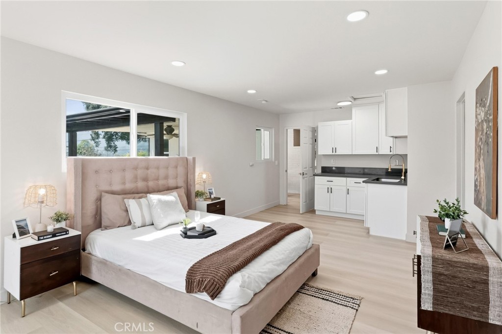 3328 North Verdugo Road Glendale, CA 91208 - Photo 17 of 42 a bedroom with a bed and a view of kitchen
