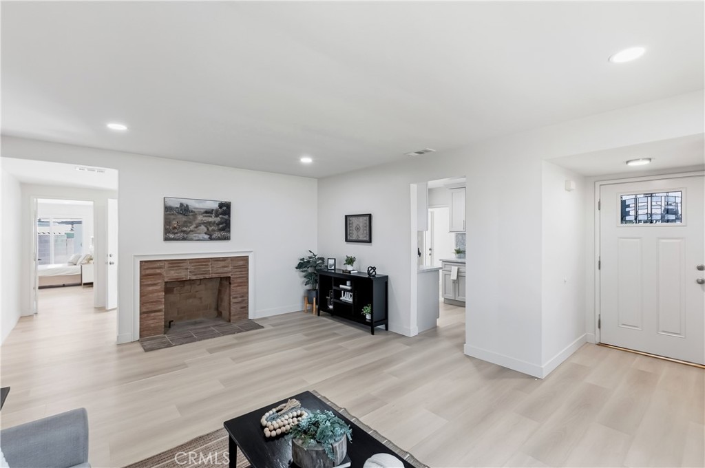 3328 North Verdugo Road Glendale, CA 91208 - Photo 6 of 42 an entryway and livingroom with fireplace