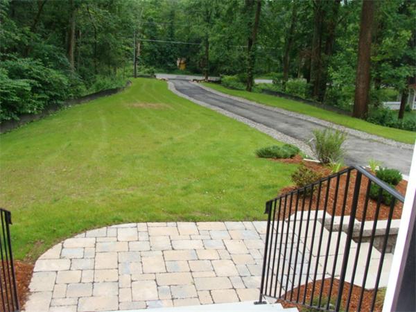53 Frankland Road Ashland, MA 01721 - Photo 13 of 17 a view of a backyard with a garden