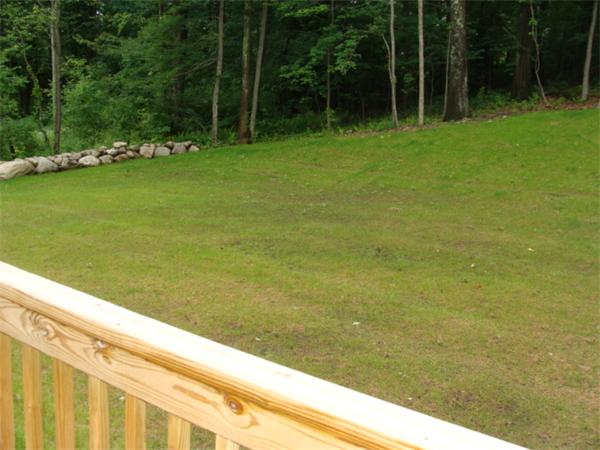 53 Frankland Road Ashland, MA 01721 - Photo 15 of 17 a view of a lake from a balcony