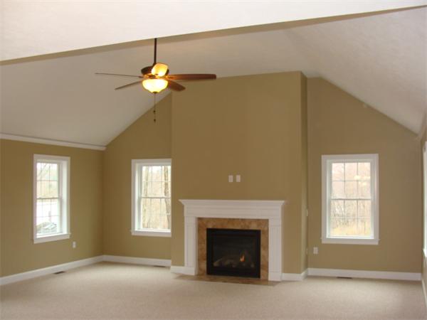 53 Frankland Road Ashland, MA 01721 - Photo 16 of 17 a living room with furniture and a fireplace