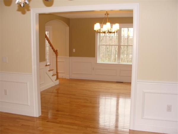 53 Frankland Road Ashland, MA 01721 - Photo 17 of 17 a view of an empty room with wooden floor and a window