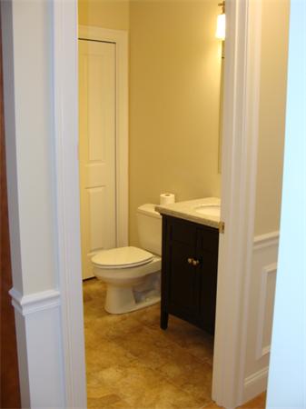 53 Frankland Road Ashland, MA 01721 - Photo 7 of 17 a bathroom with a toilet and a sink