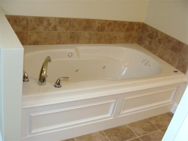 53 Frankland Road Ashland, MA 01721 - Photo 10 of 17 a bathroom with a bathtub