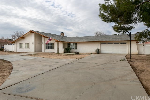 19399 Yanan Road Apple Valley, CA 92307 - Photo 1 of 1 a view of large house with a outdoor space